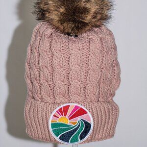 Pink stocking cap with "Ocean Wave" patch and fuzzy lining